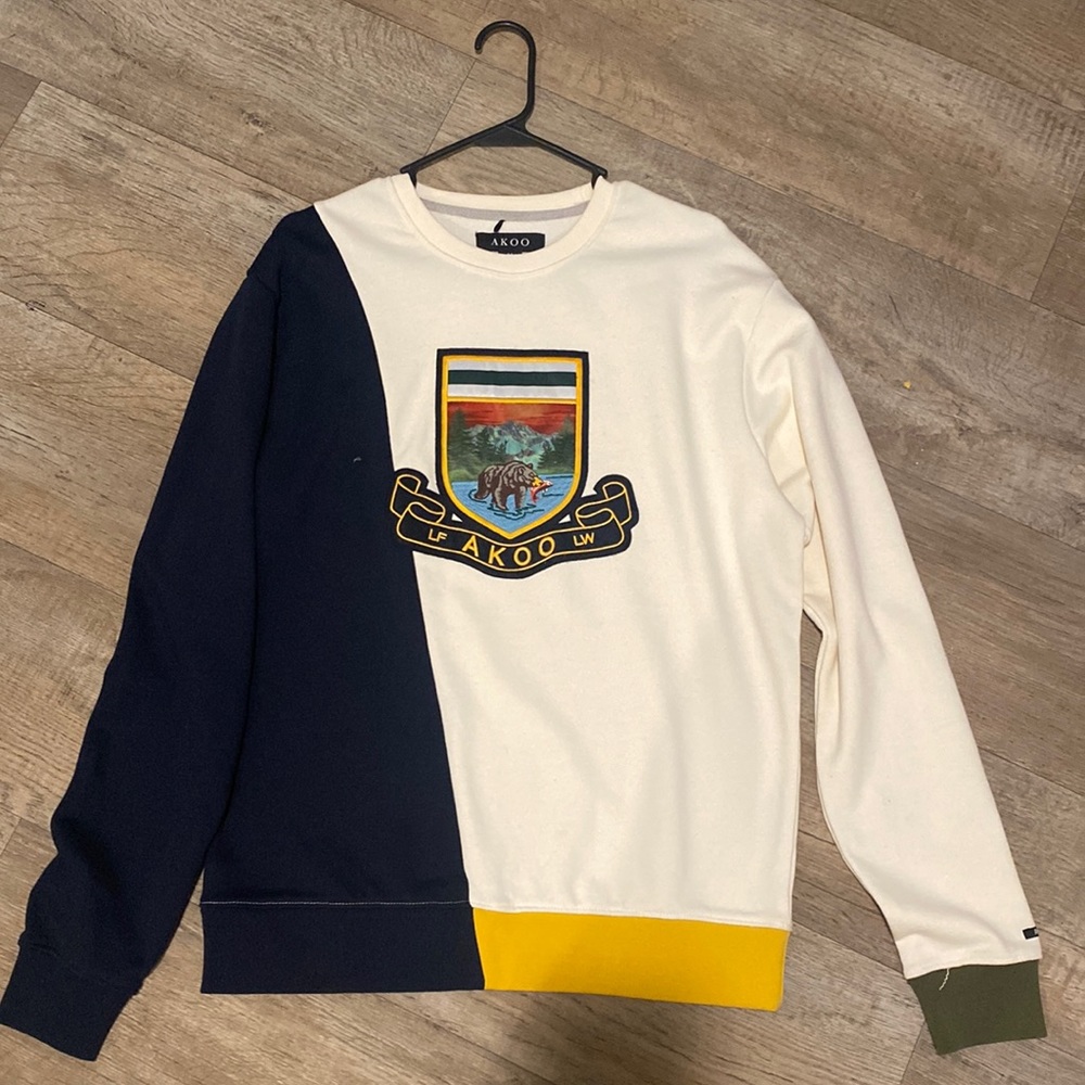 Brand new medium AKOO sweater (Never worn, but tags were removed)